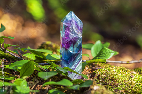 Quadro su tela Magic still life with Gemstones fluorite crystal on nature background