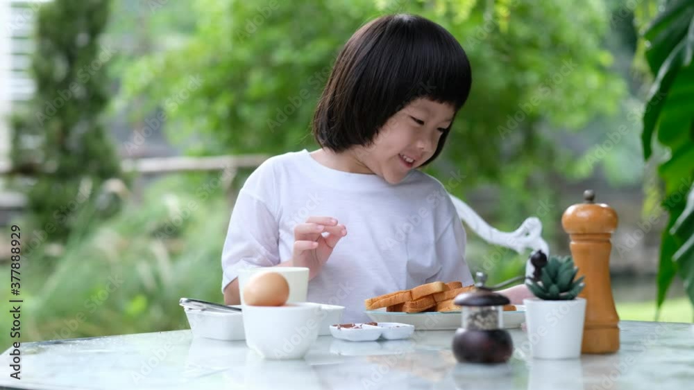 Kid eating food, happy time, breakfast
Kid eating food, happy time, breakfast