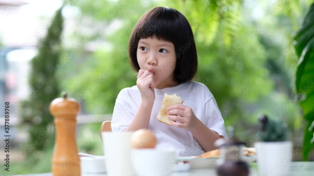 Kid eating food, happy time, breakfast
Kid eating food, happy time, breakfast