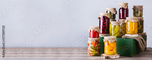 Homemade preserved, fermented food, pickled, marinated vegetables, fruit compote photo