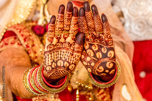 Photography Indian Bride getting ready for the marriage with mehndi on her hand sambalpur,or