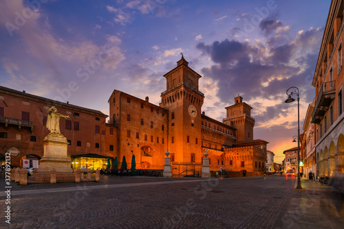 Fototapeta Naklejka Na Ścianę i Meble -  Castle Estense (Castello Estense) and piazza Savonarola and monumet to Savonarola in Ferrara, Emilia-Romagna, Italy. Ferrara is capital of the Province of Ferrara