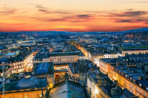 Aerial view of the skyline of Royal Bath Spa with red twilight sky