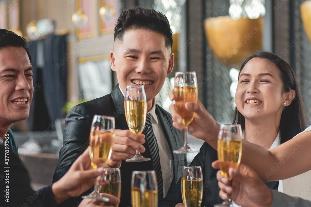 Asian business people drinking celebrate happy business success