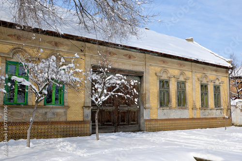 old  house in bright snowy winter day, Backi Petrovac, Vojvodina