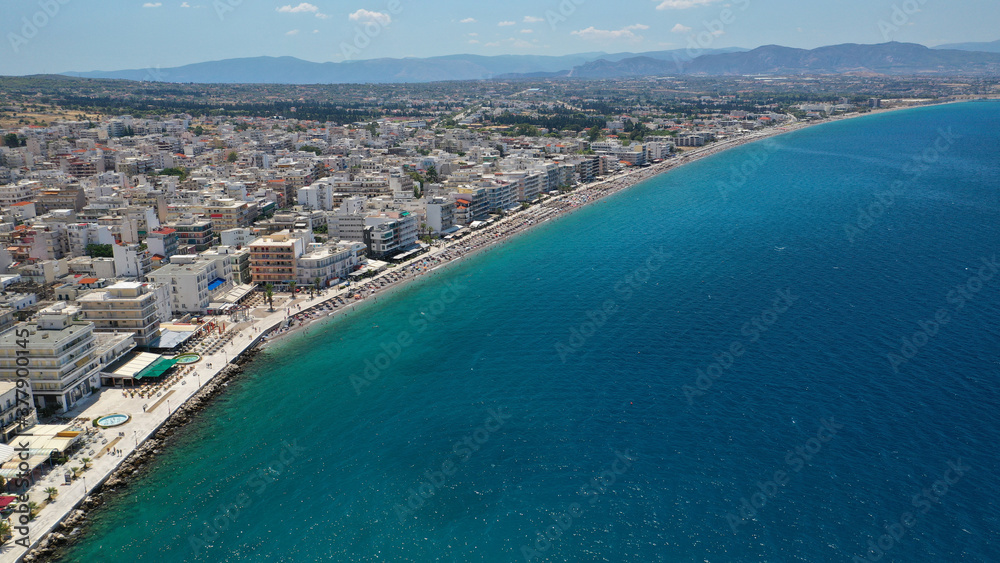 Fototapeta premium Aerial drone photo of famous seaside area, organised beach and bay of Loutraki town, Corinthian bay, Greece