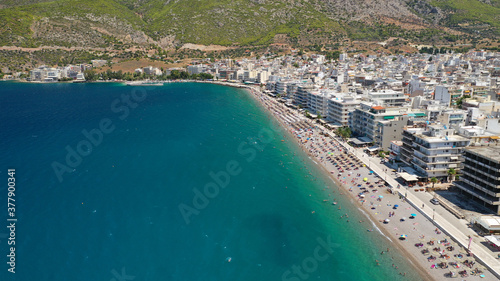 Aerial drone photo of famous seaside area  organised beach and bay of Loutraki town  Corinthian bay  Greece