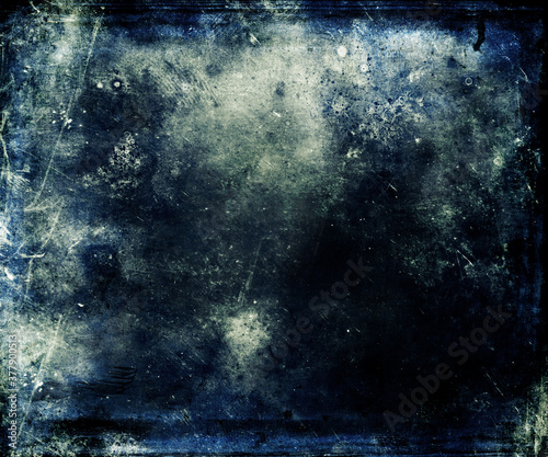Grunge dark blue scratched background, distressed texture with frame