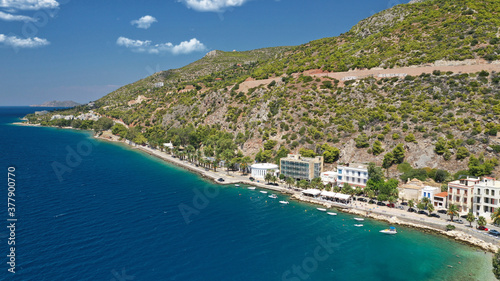 Aerial drone photo of famous seaside area, organised beach and bay of Loutraki town, Corinthian bay, Greece