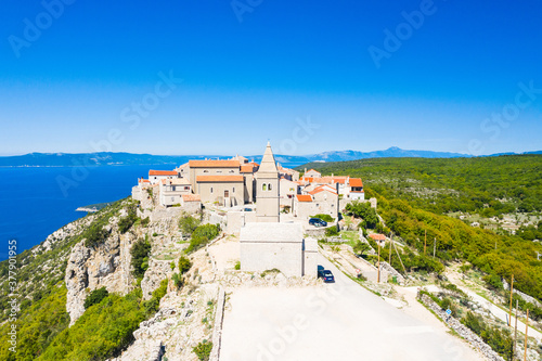 Amazing historical town of Lubenice on the high cliff, Cres island in Croatia, Adriatic sea in background