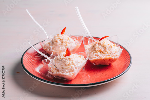 Traditional Spanish Russian salad with tuna on a plate