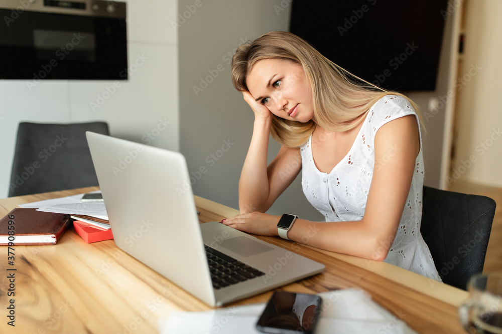 Online learning, studying. Woman with laptop in depression at home office. Work at home Online learning, studying. Woman with laptop in depression at home office. Work at home