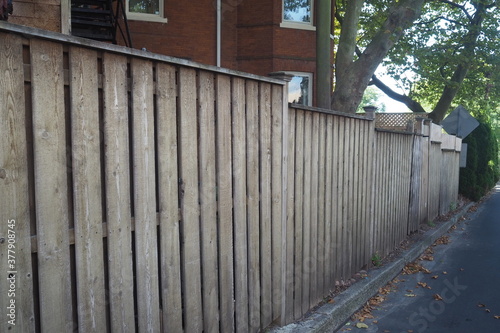 The long wooden fence.