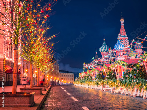 Christmas in the capital of Russia. New Year Moscow. Festive evening in Moscow. Christmas market in Moscow. New year in the Russian Federation. Christmas decorations on red square. © Grispb