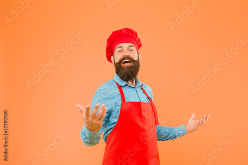 Cook bearded man excited about delicious meals, excellent recipe concept