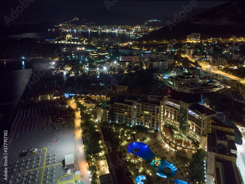 Wallpaper Mural Budva and Becici city lights from Montenegro seen from drone. Montenegro Torontodigital.ca