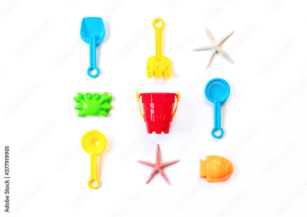 Children's beach toys isolated on white background. Top view