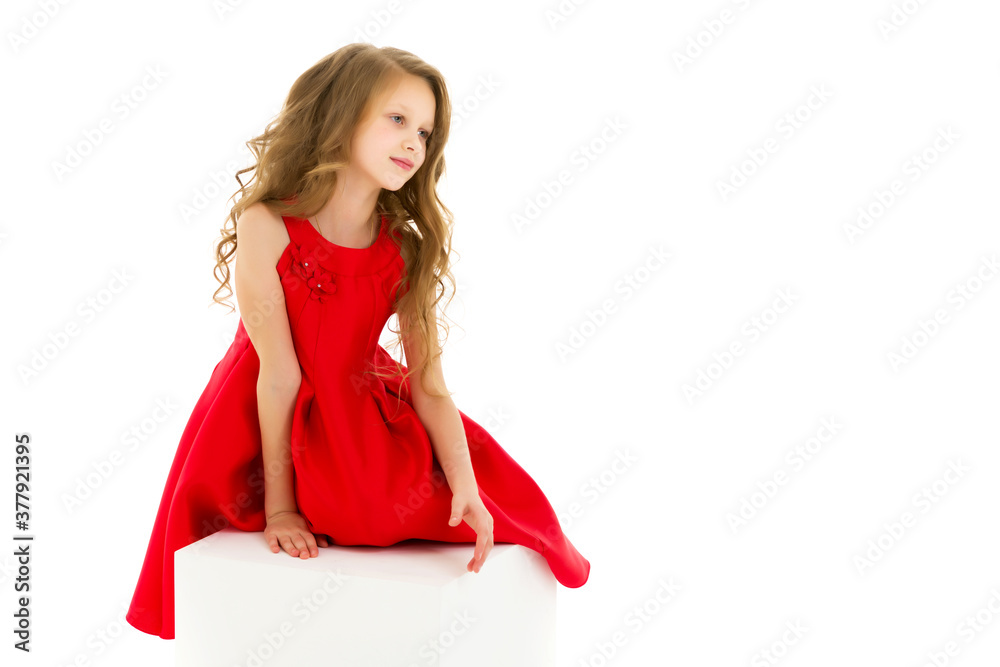 Portrait of Beautiful Preteen Girl in Red Dress Posing in Studio Portrait of Beautiful Preteen Girl in Red Dress Posing in Studio