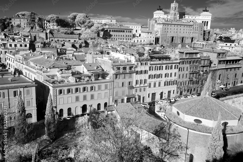 Classic Rome - aerial view to old roof buildings and street, Italy