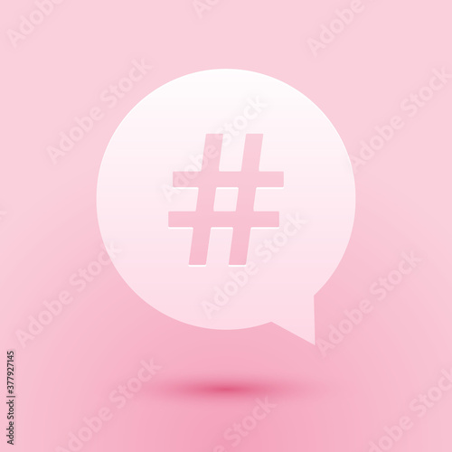 Paper cut Hashtag in circle icon isolated on pink background. Social media symbol, concept of number sign, social media, micro blogging pr popularity. Paper art style. Vector.