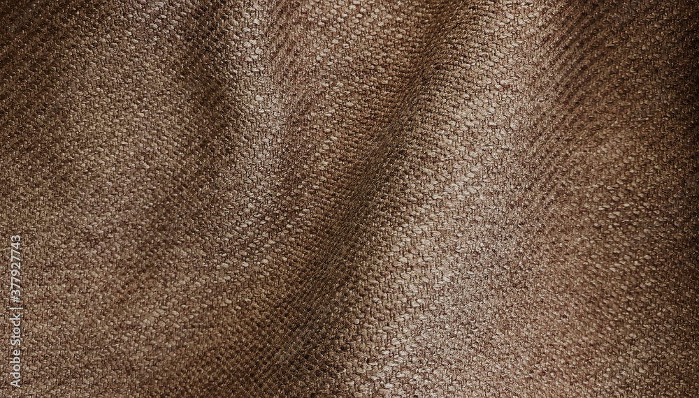 Crumpled brown sack cloth fabric texture, wavy wrinkled cloth pattern. soft linen fabric background. Crumpled brown sack cloth fabric texture, wavy wrinkled cloth pattern. soft linen fabric background.