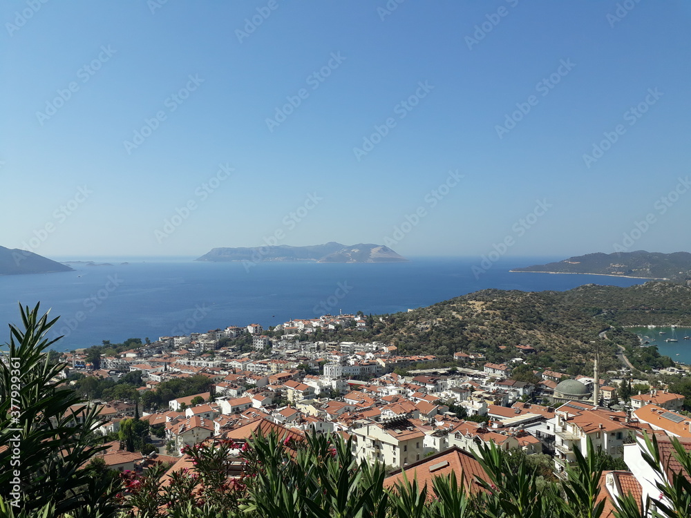 Obraz premium Beautiful aerial view of Kastellorizo Island of Greece with lots of roof and sea