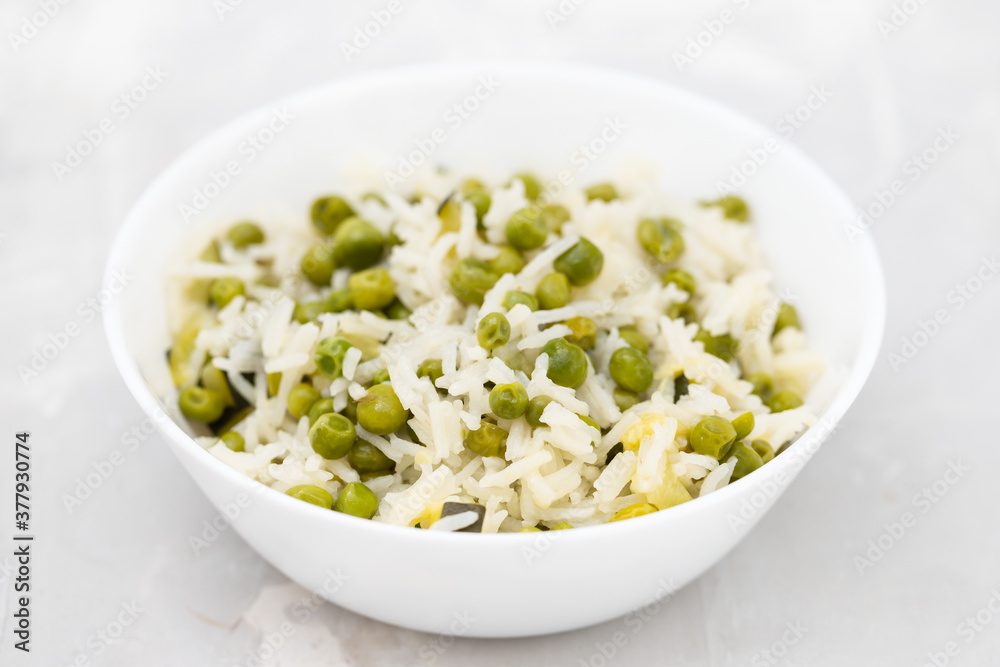 boiled rice with green vegetables in the dish boiled rice with green vegetables in the dish