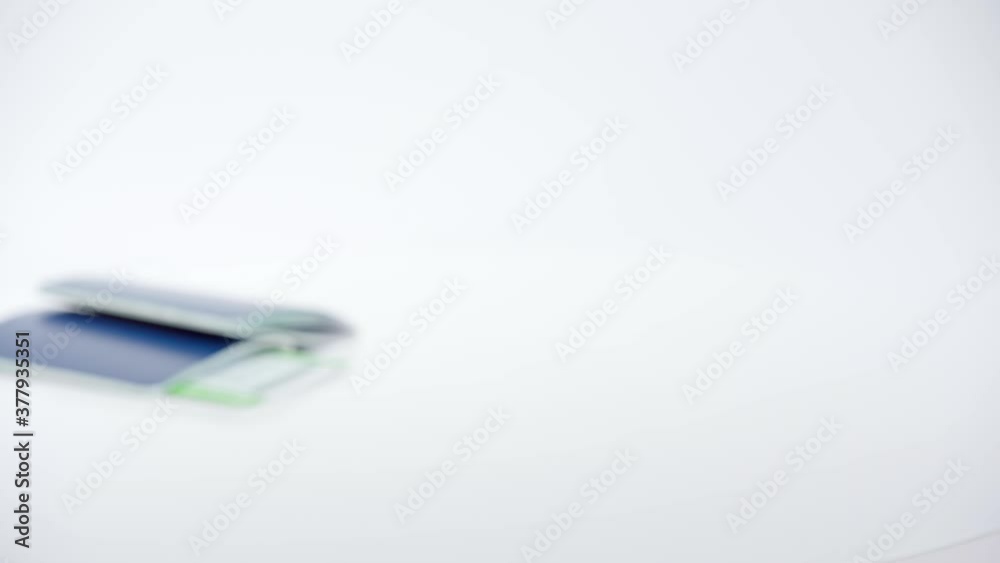 Cropped view of man in latex gloves tearing boarding pass on white background Cropped view of man in latex gloves tearing boarding pass on white background