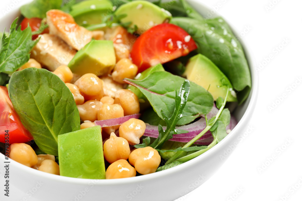Delicious salad with chicken, avocado and chickpeas in bowl on white background, closeup Delicious salad with chicken, avocado and chickpeas in bowl on white background, closeup