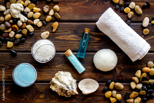 Beauty and fashion concept with spa set and seashells