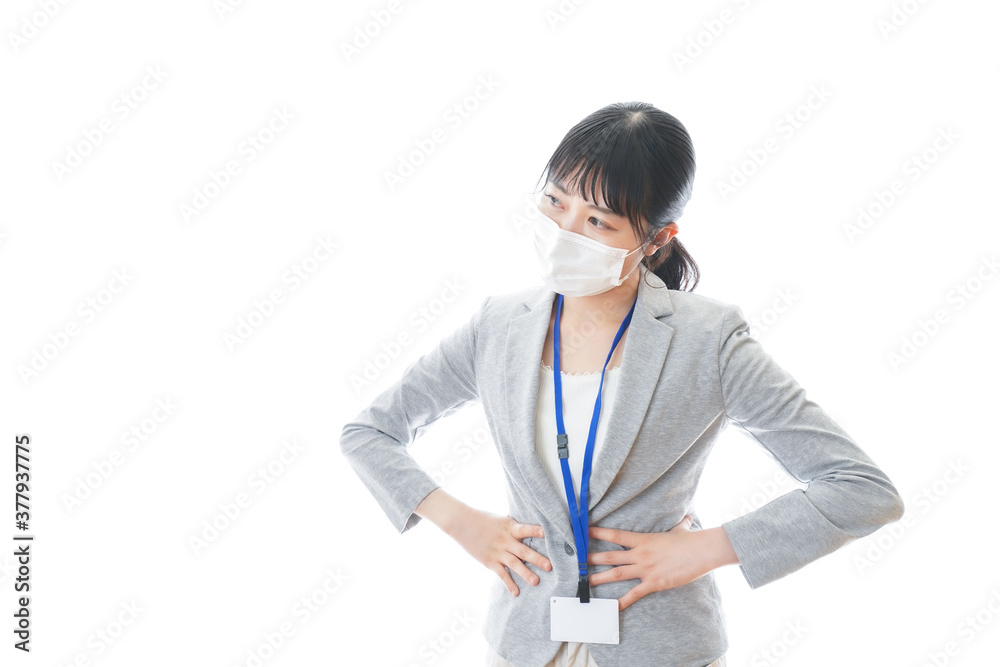 腹痛に苦しむ若いビジネスパーソン 腹痛に苦しむ若いビジネスパーソン