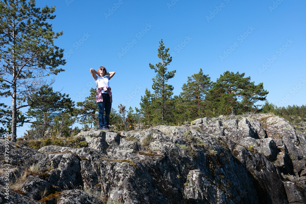 Woman on island in Ladoga skerries