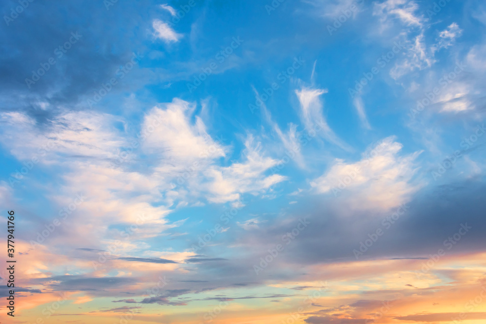 Evening sky frame with cirrus clouds at sunset.