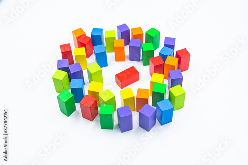 Untidy variety colorful blocks see sleep red block at white background