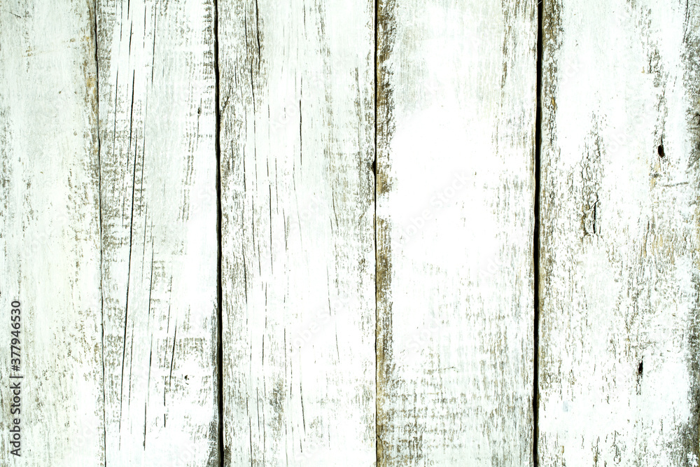 Vertical wooden background from old white planks. Vertical wooden background from old white planks.