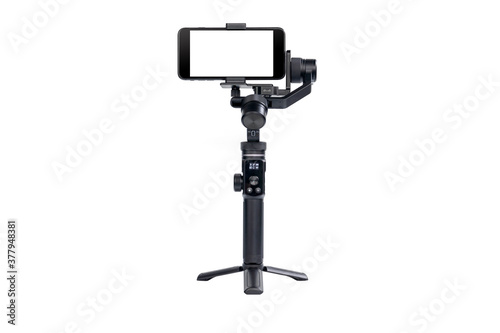 Mobile phone is mounted on a 3-axis motor stabilizer for smooth video recording isolated on white background.