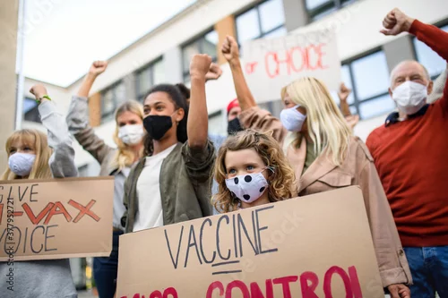 Obraz People with placards and posters on public demonstration, no covid vaccine concept.