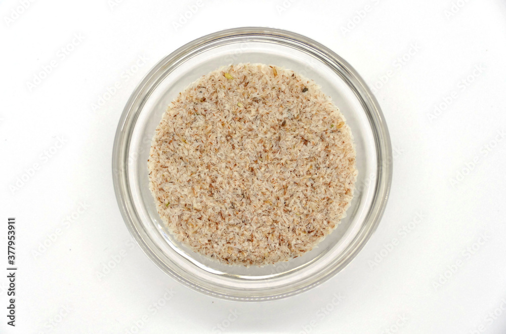 psyllium seeds in a transparent bowl, detailed view in a photo box psyllium seeds in a transparent bowl, detailed view in a photo box