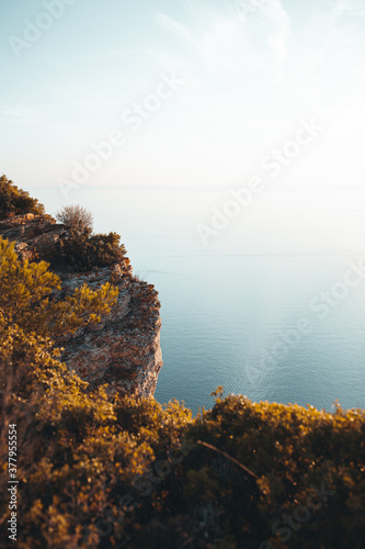 wild red rocks of the cliff of canaille cap and cassis city behi photo