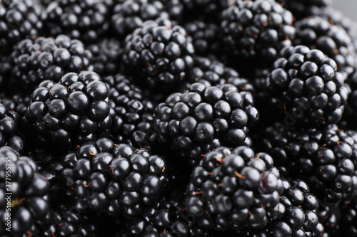 Tasty ripe blackberries as background, closeup view
