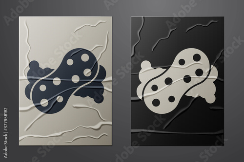 White Sponge with bubbles icon isolated on crumpled paper background. Wisp of bast for washing dishes. Cleaning service logo. Paper art style. Vector.