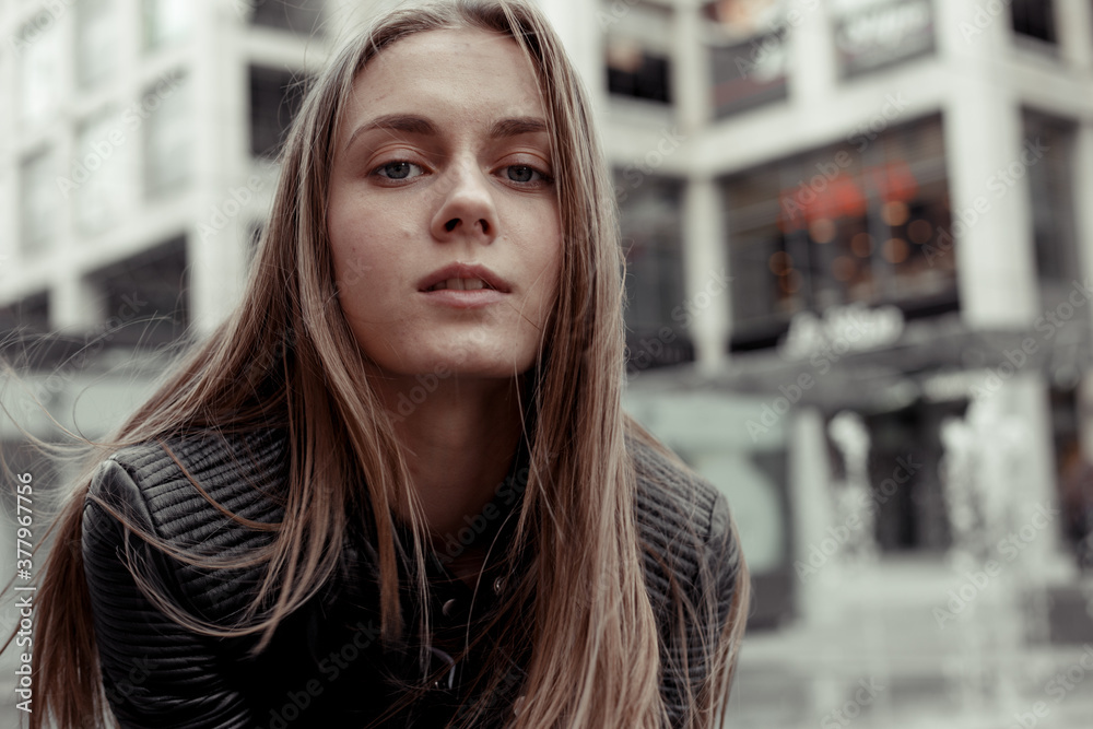 Close-up portrait blonde woman in black leather jacket Close-up portrait blonde woman in black leather jacket