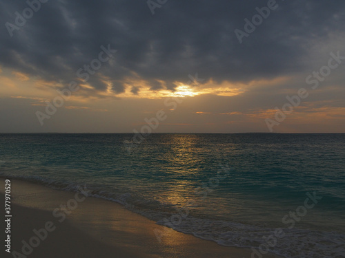 Sunset view above the water of the ocean in Zanzibar island  Tanzania. Copy space for text.