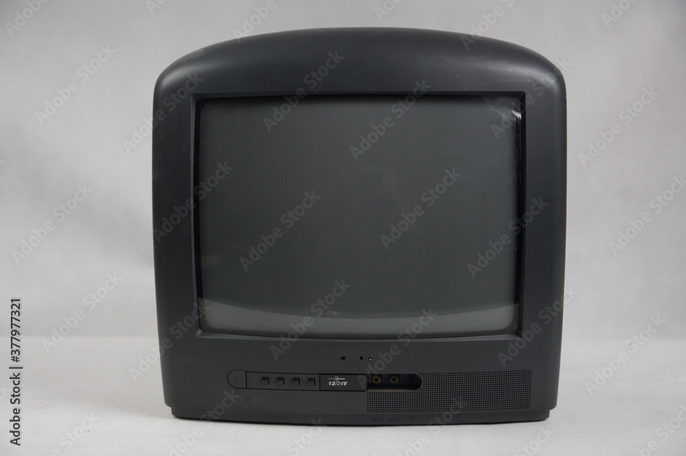 Old 14-inch, portable, black, mains and battery-powered TV