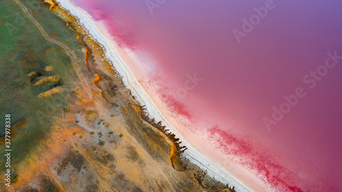 Fototapeta Naklejka Na Ścianę i Meble -  Top view of the salt-covered shore of Pink Lake.