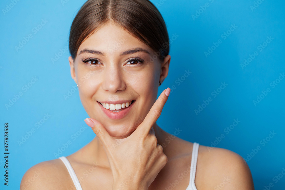 Portrait of beautiful young woman with perfect smile Portrait of beautiful young woman with perfect smile