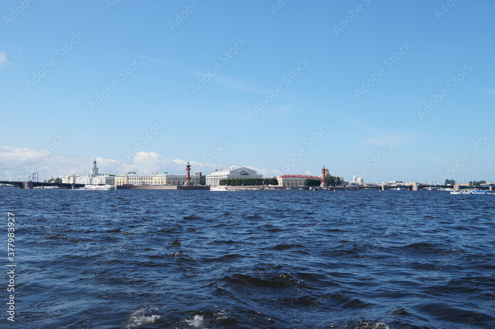 View from a boat to the coast in the city of St. Petersburg in Russia, you can see beautiful buildings on the embankment