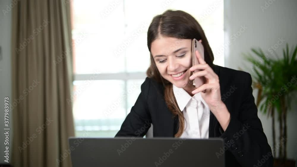 Working women are on the phone to talk about work in office. And have fun in conversation. Working women are on the phone to talk about work in office. And have fun in conversation.