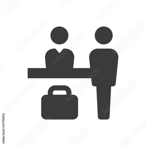 Hotel reception black vector icon. Receptionist desk and suitcase simple glyph symbol.