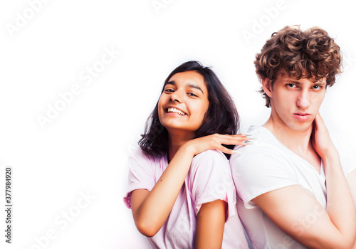 best friends teenage girl and boy together having fun, posing emotional on white background, couple happy smiling, lifestyle people concept, blond and brunette multi nations